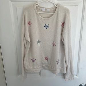 Soft cream color girls pullover size 6 with stars on the front